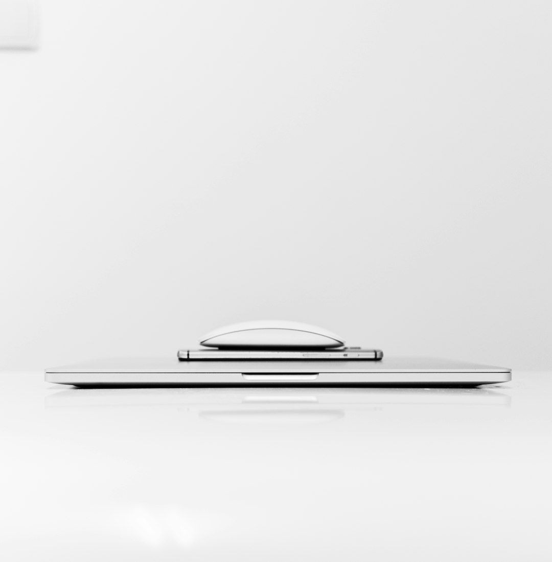 A laptop showing a finished website page: your free preview